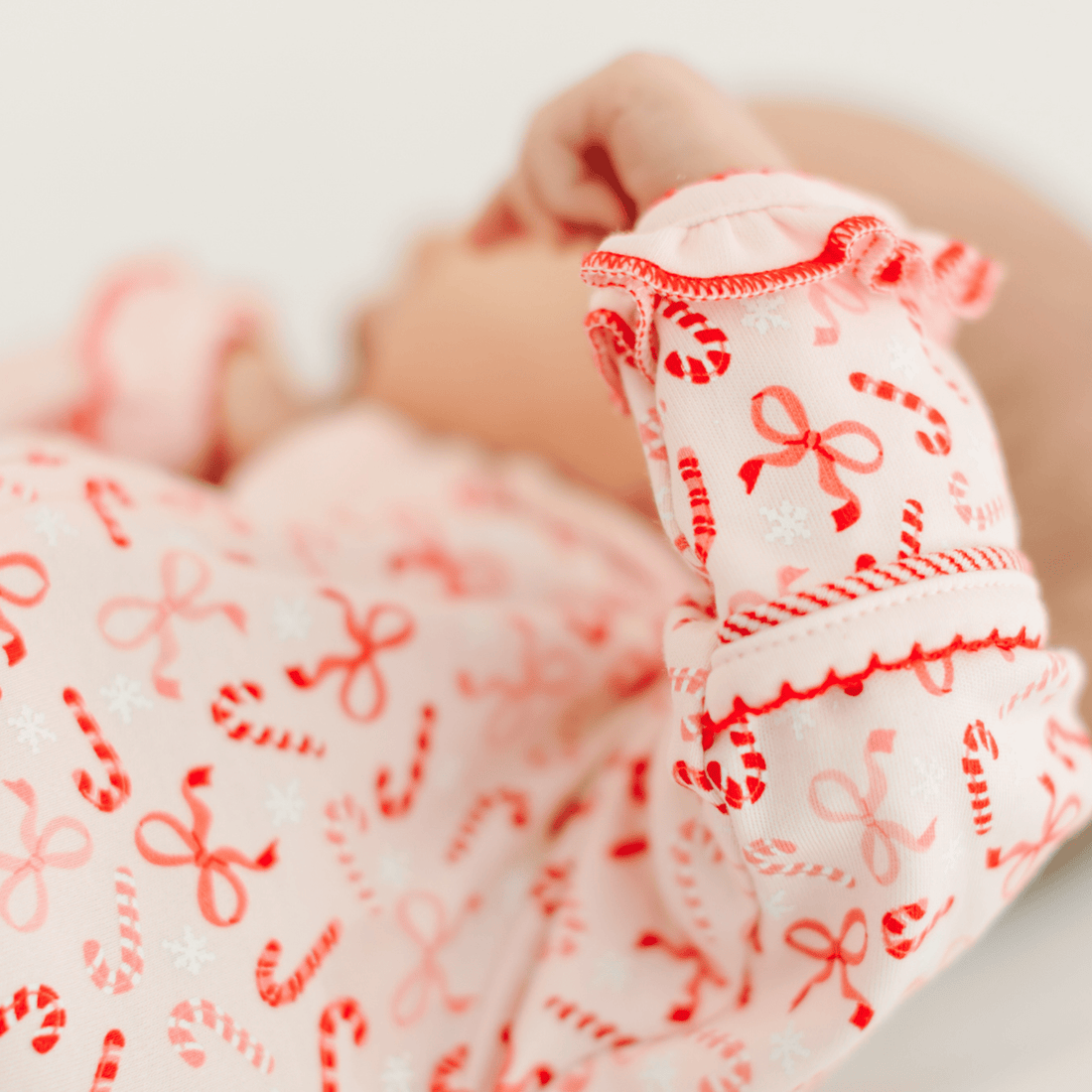 Candy Cane Lane Zip Ruffle Footie