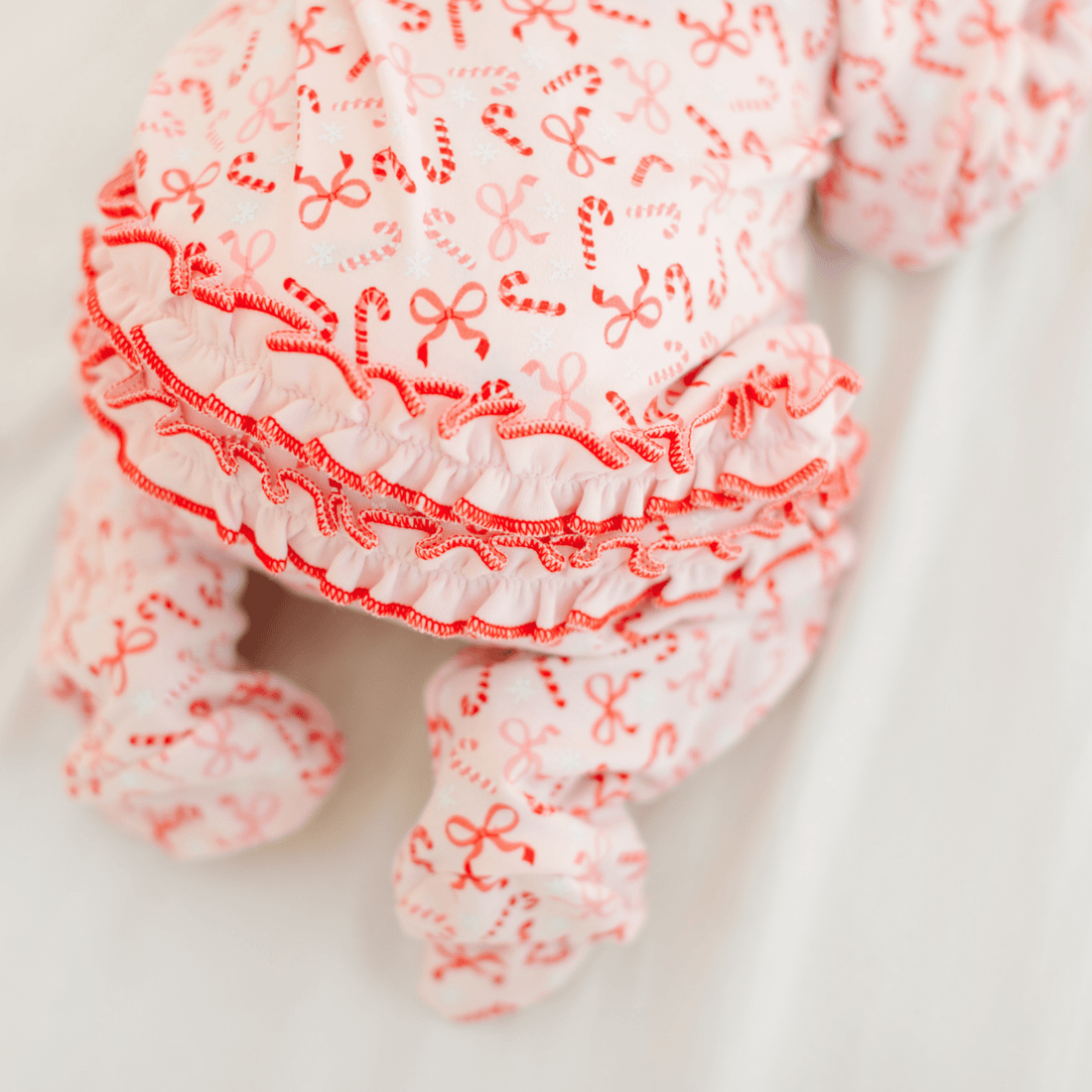 Candy Cane Lane Zip Ruffle Footie